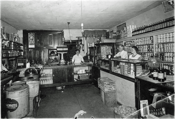 A. L. Davis & wife in grocery store